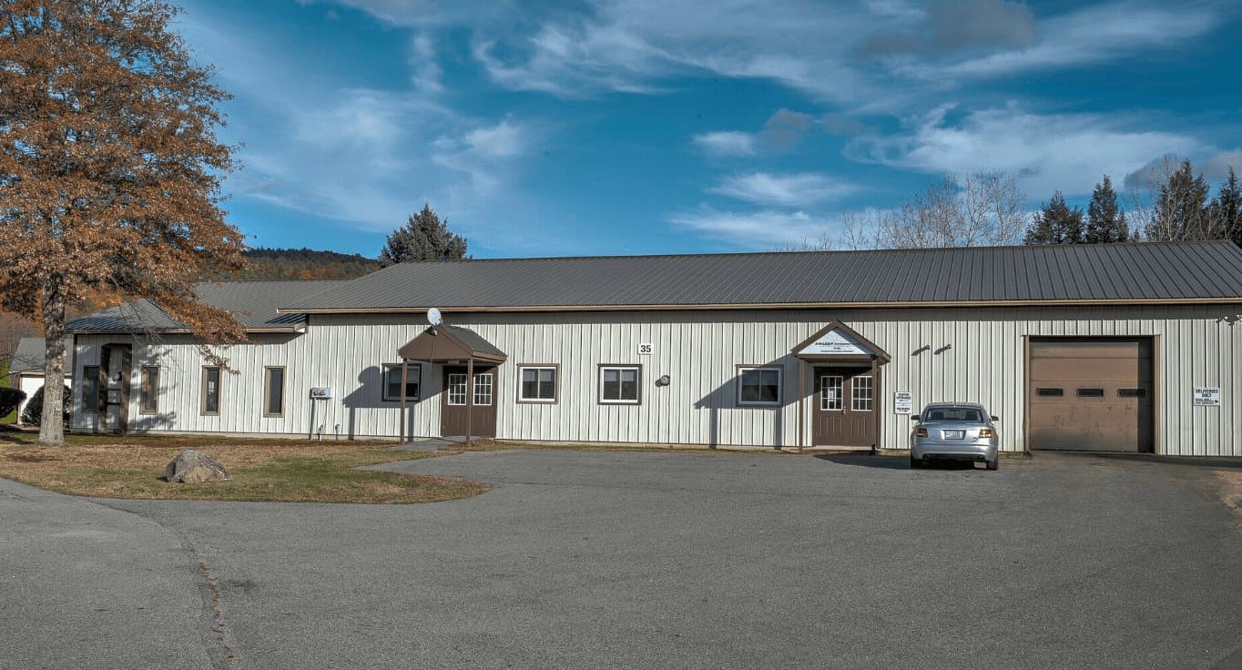 Flex industrial building with office entries and a drive-in door
